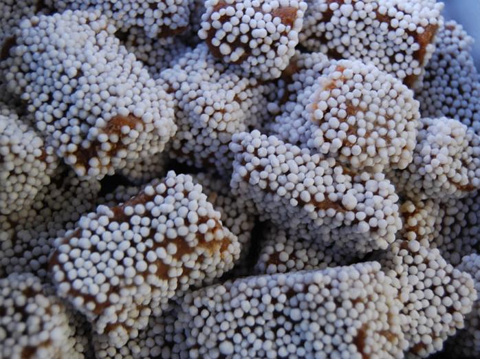 A pile of chewy, sugar-coated caramels represents the sweetness found in learning Hindi.
